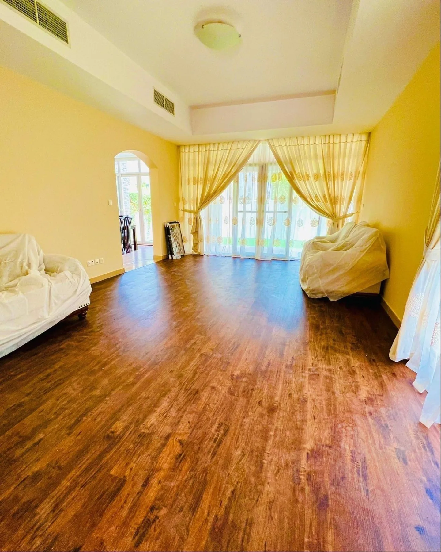 Dark wood flooring with matching stair cladding